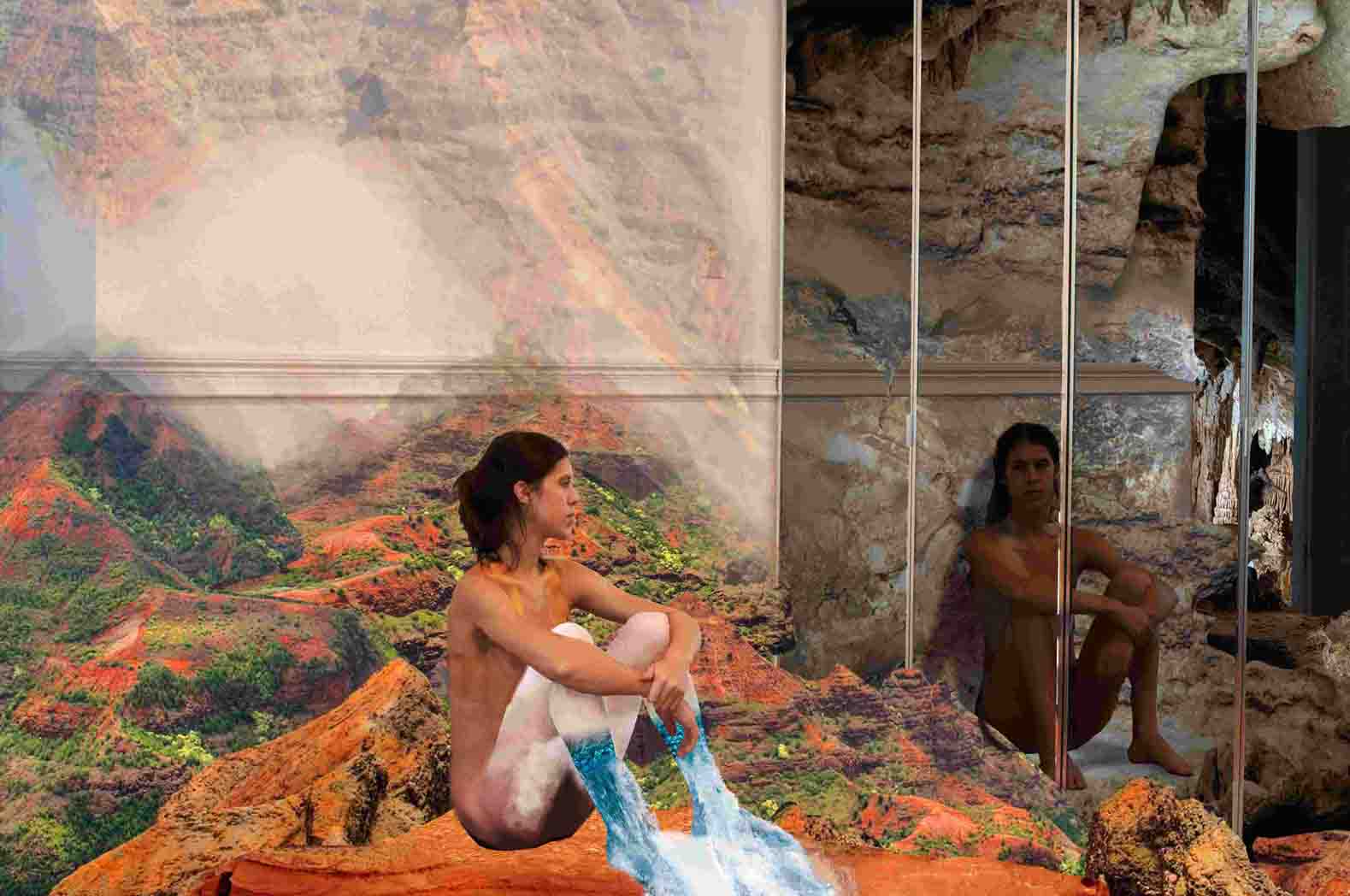 First progress point: The same figure and its reflection in the four-part mirror have each been transported into partially-formed realms. The rightmost figure, the reflection, is in a dark cavern draped in shadow that exists on the other side of the four-paned mirror. The figure in the real world is now brightly lit, seated on a red-orange mesa formation in front of the red-orange canyon that merges with the wall of the room in the background. The figures’ legs are overlaid with steam that turns to water as it reaches their shins. This water flows into a waterfall off the edge of the mesa.