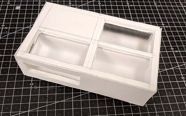 Side 1 of foam core table model F, it’s fully framed with four sections viewable from the top and two from the front edge. One of the four top sections and one of the two front sections are solid.